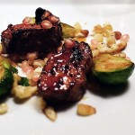 Charsiu pork medallions with brussels sprouts, spaetzle and pomegranate seeds